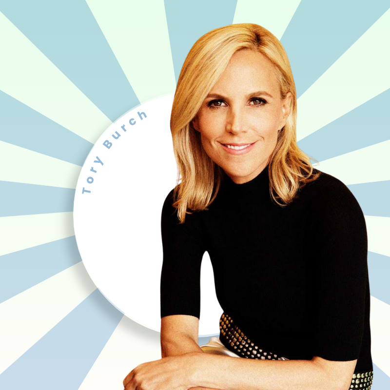 Tory Burch smiles confidently in a black turtleneck top against blue starburst background with white circular frame; text overlay reads "Tory Burch" in elegant blue script.​